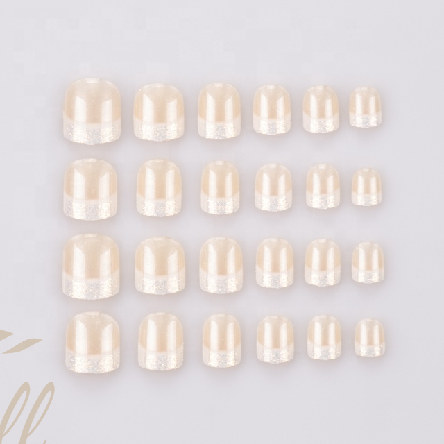 The latest trend is pale orange French artificial nails